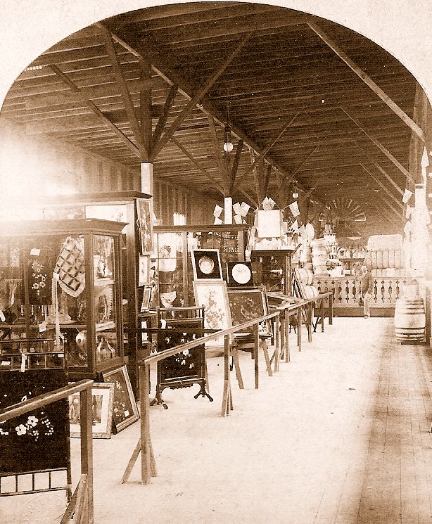Photograph of women's handiwork at the 1884 World's Fair. 